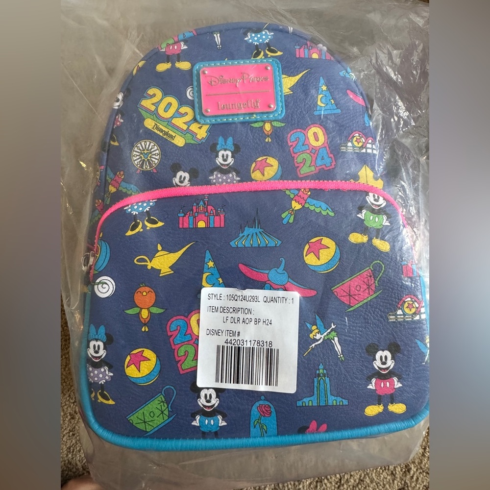 Loungefly Blue and Pink Disney Bag with Whimsical Patterns